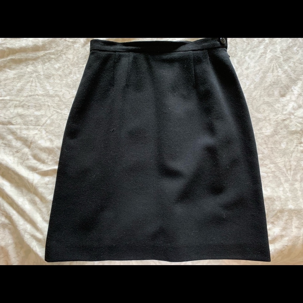 A Wear black wool skirt